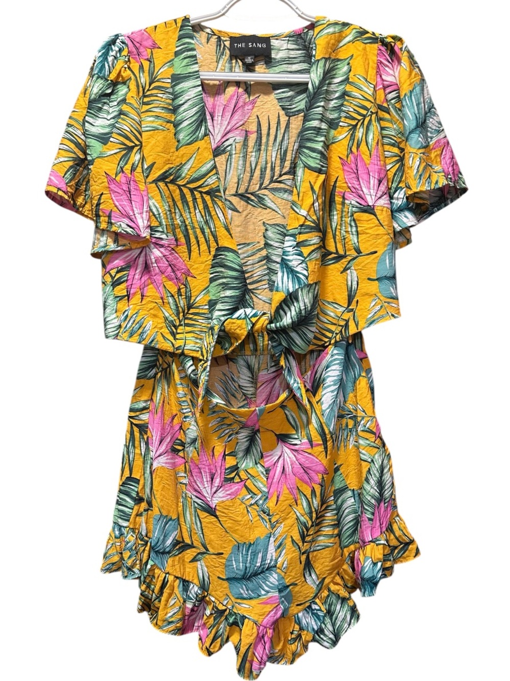 The Sang Tropical Print Tie Front Ruffle Bottom Romper